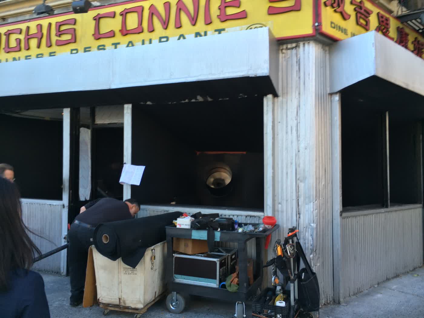 An emptied restaurant with some sort of special-effects cannons pointing out of its windows.