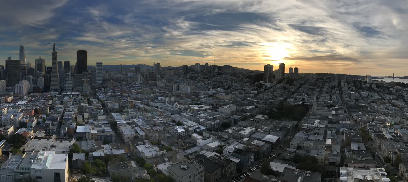 A panoramic image of San Francisco taken from Coit Tower, the tall towers of downtown SF visible on the left.