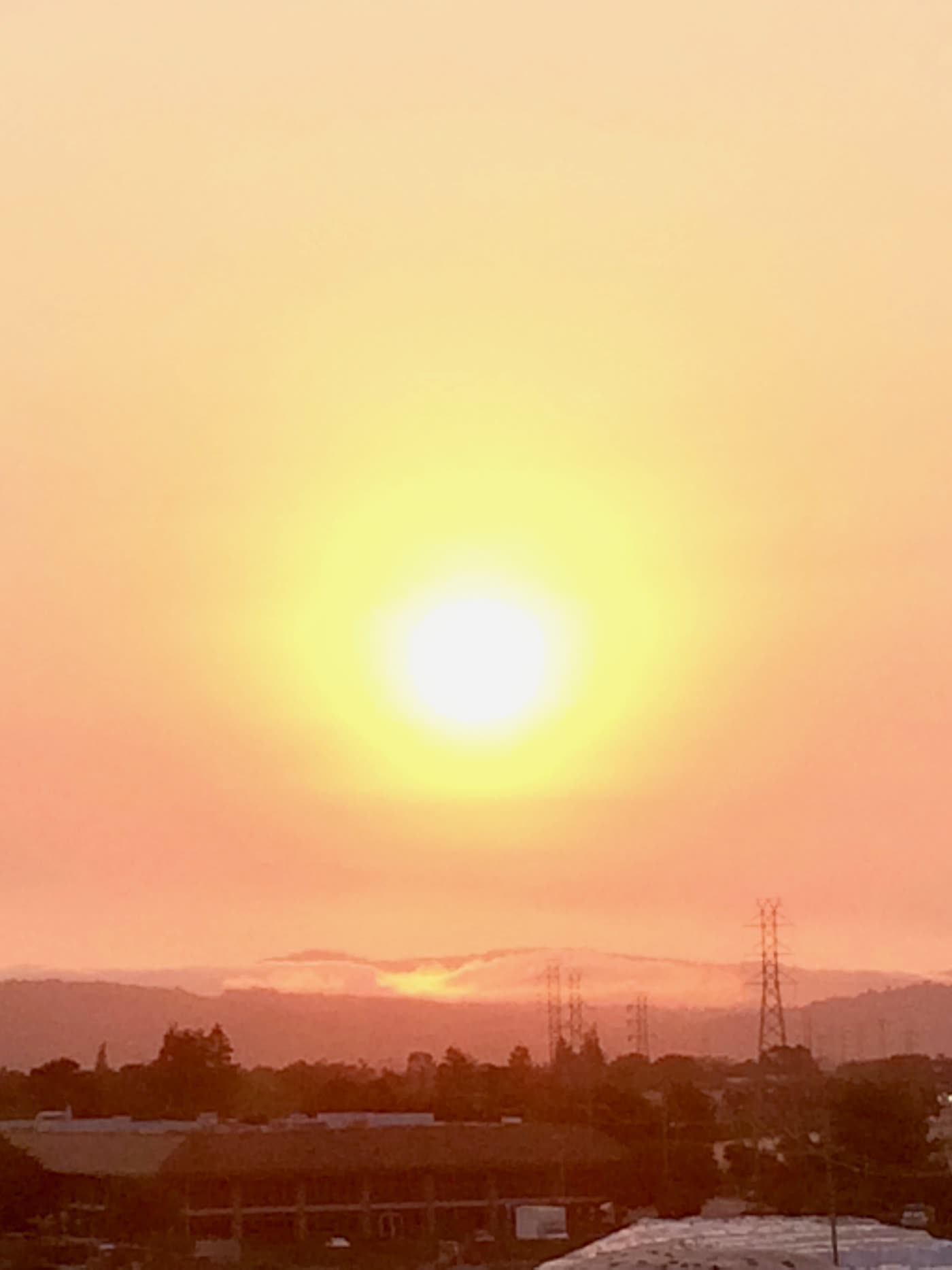 The sun setting over the mountains.