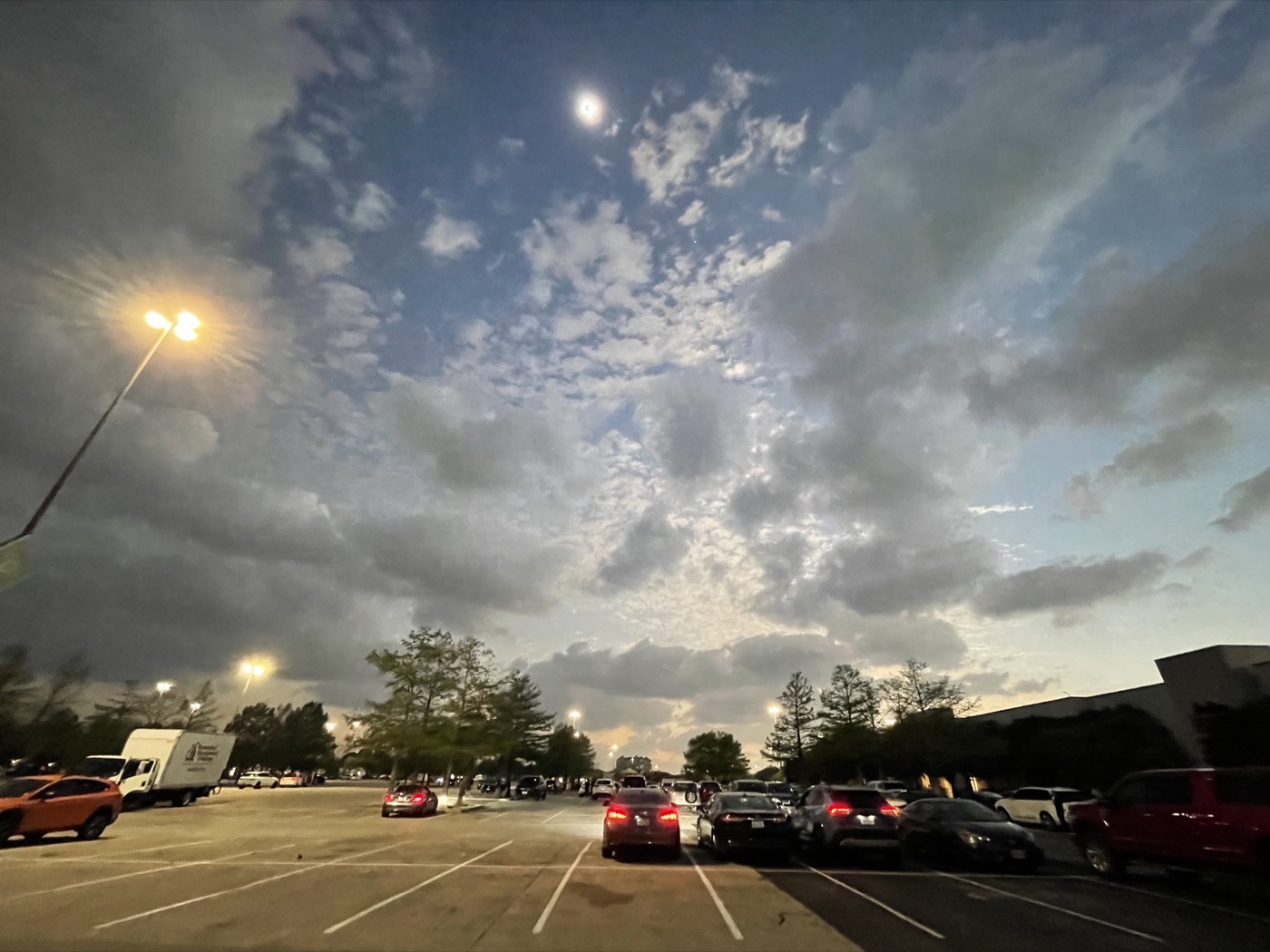 A wide-angle shot of the parking lot we were in during totality.